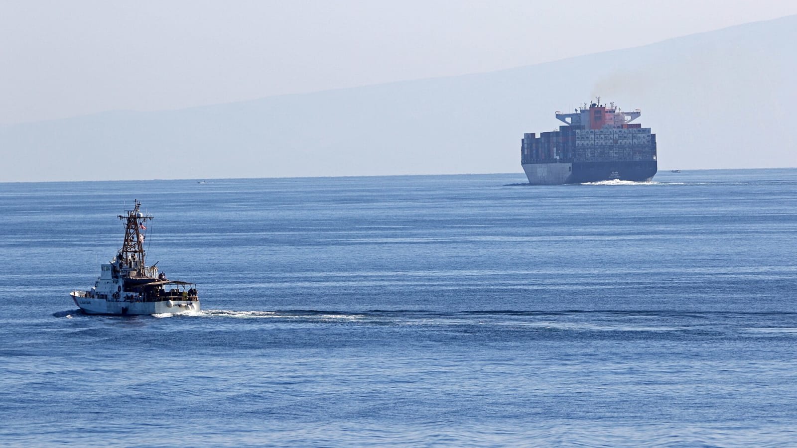 container ship at a busy industrial port (file image)