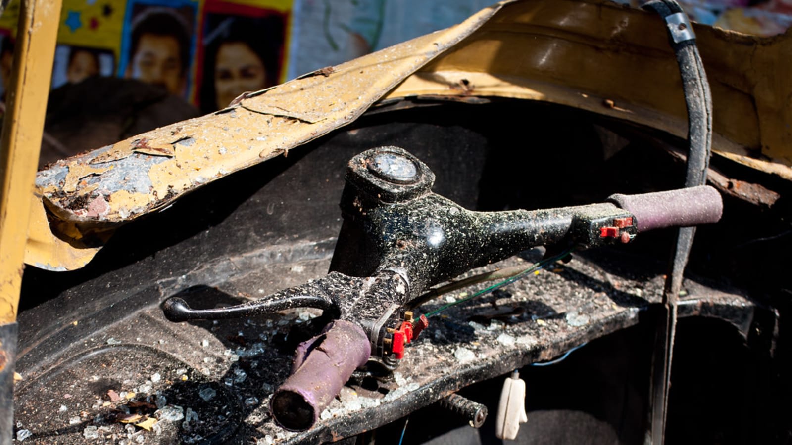 damaged auto rickshaw on a rural indian road (file image)