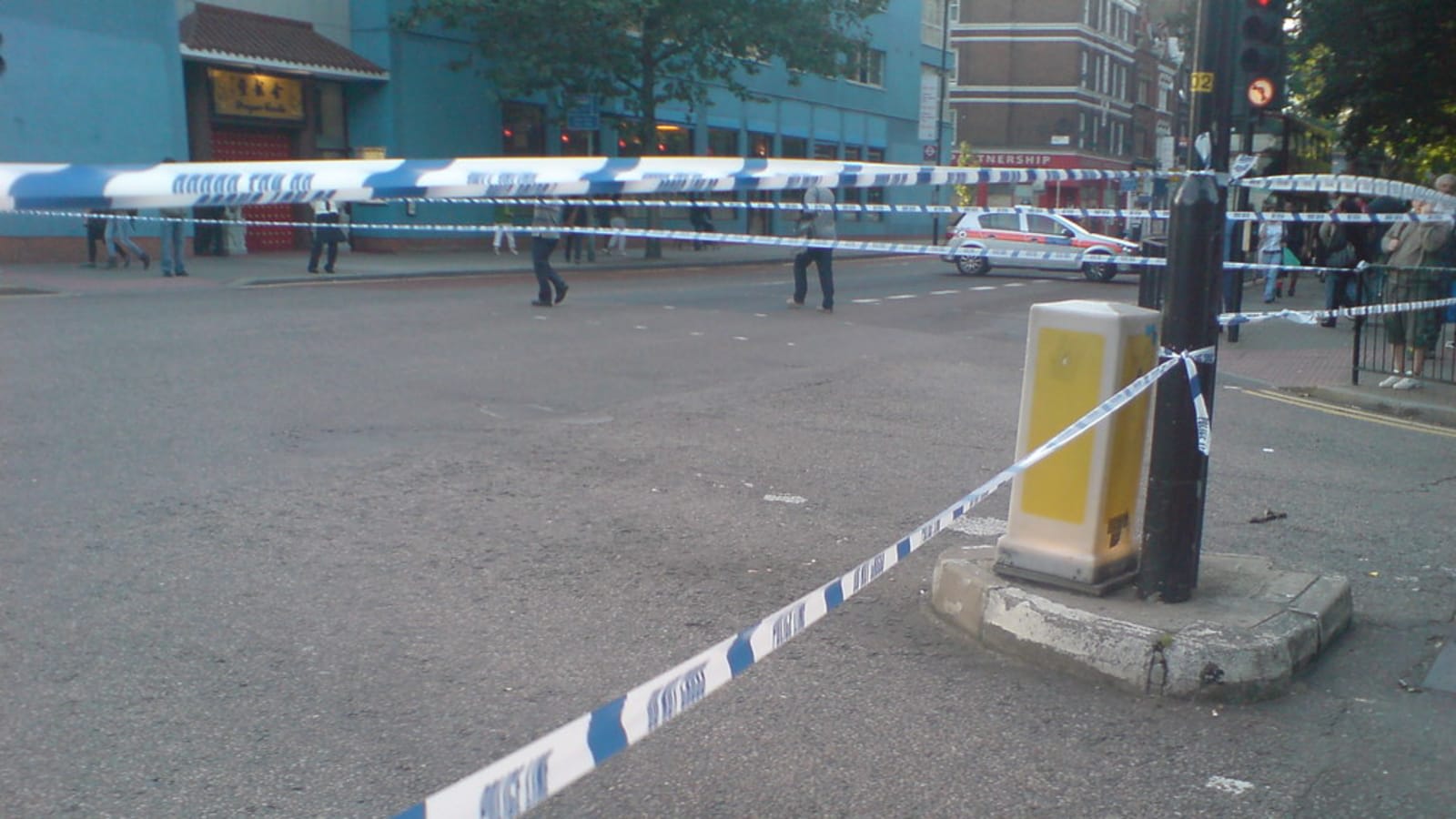 police tape blocking a suburban street at night (file image)
