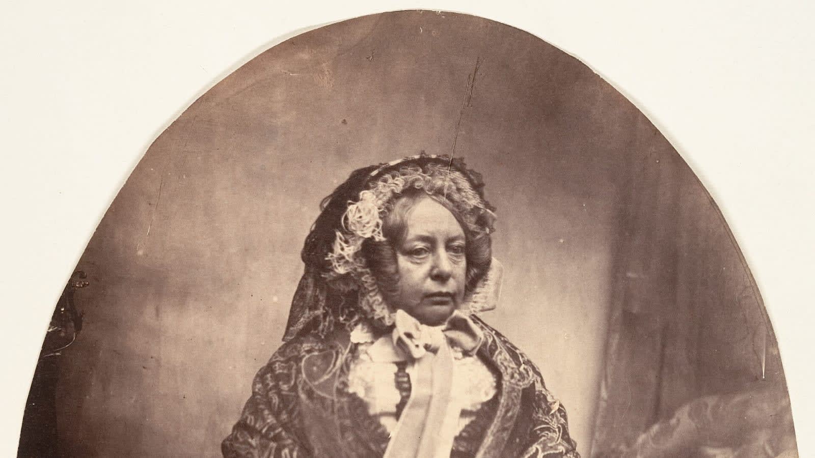elderly woman sitting in a living room (file image)