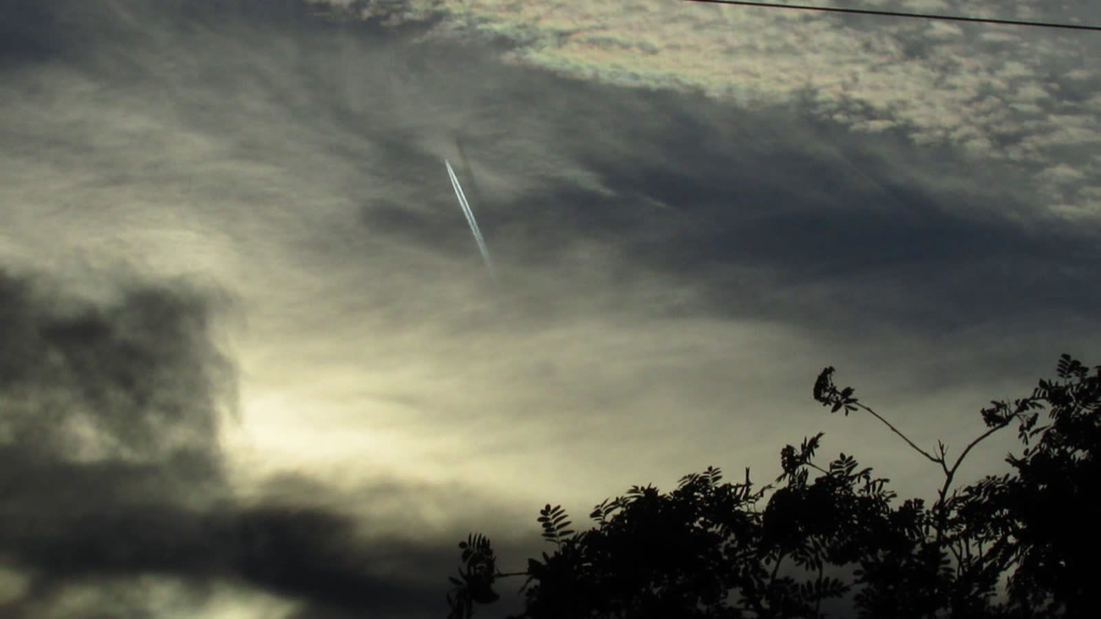 airliner flying through clear sky during afternoon (file image)