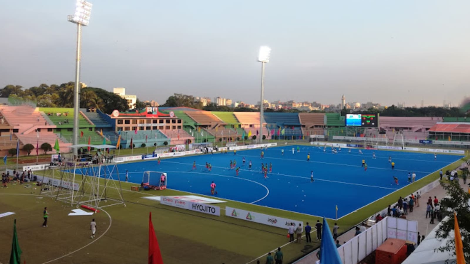 an empty hockey pitch with goals and corner flags under stadium lights (file image)