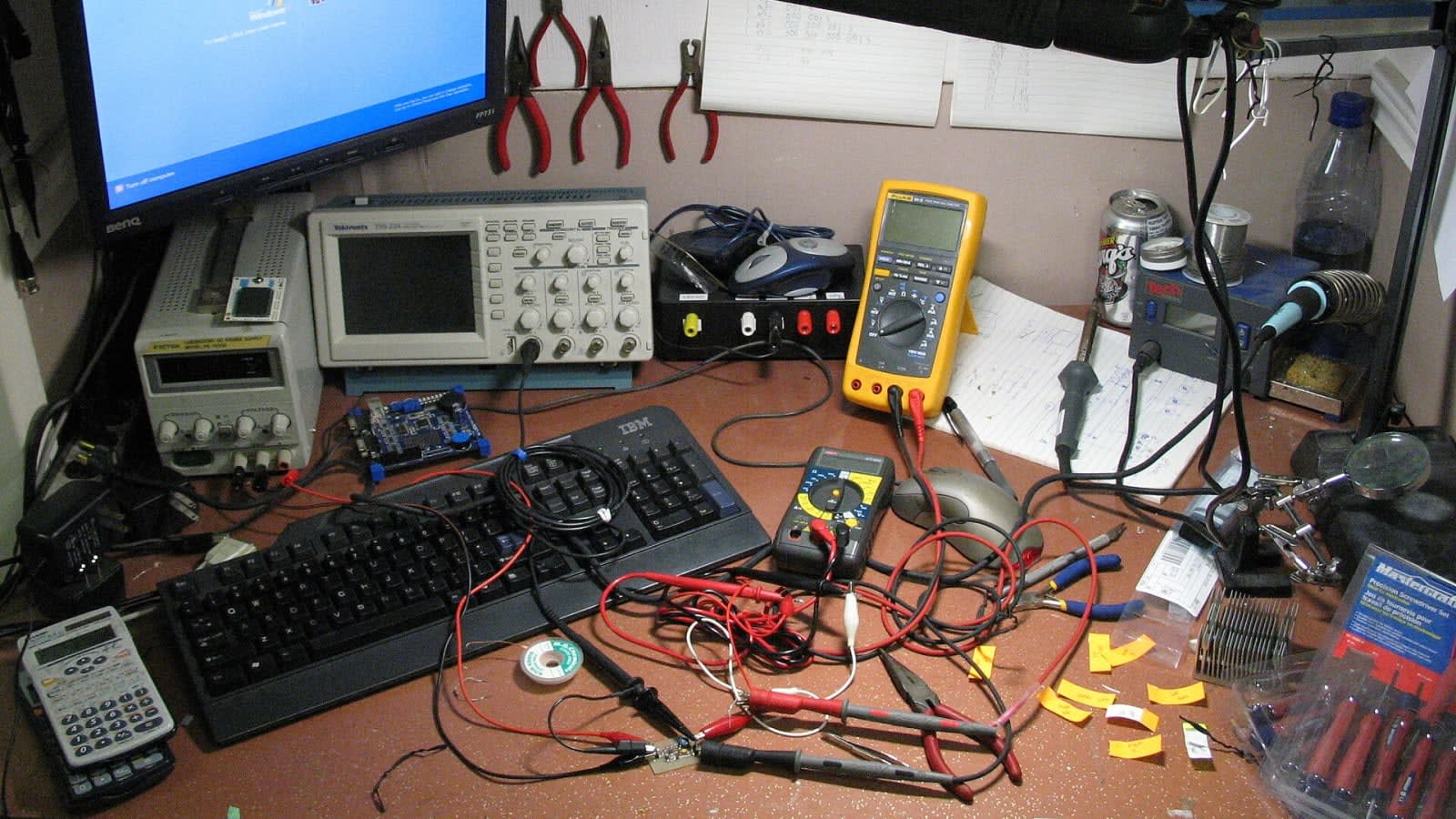 electronic components and microcontrollers on a wooden workbench (file image)