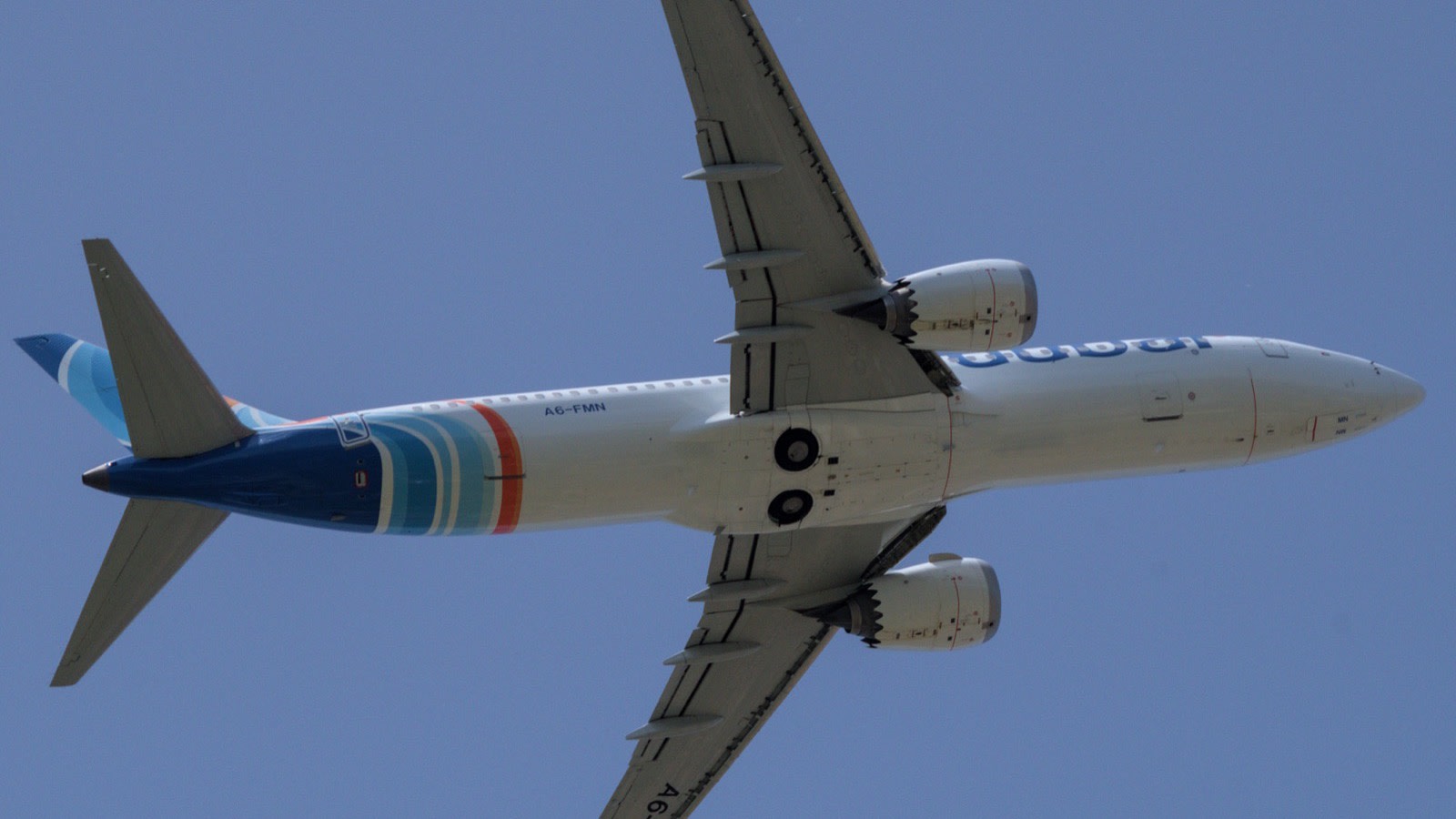 A flydubai Boeing 737-8 MAX seen from below after take-off