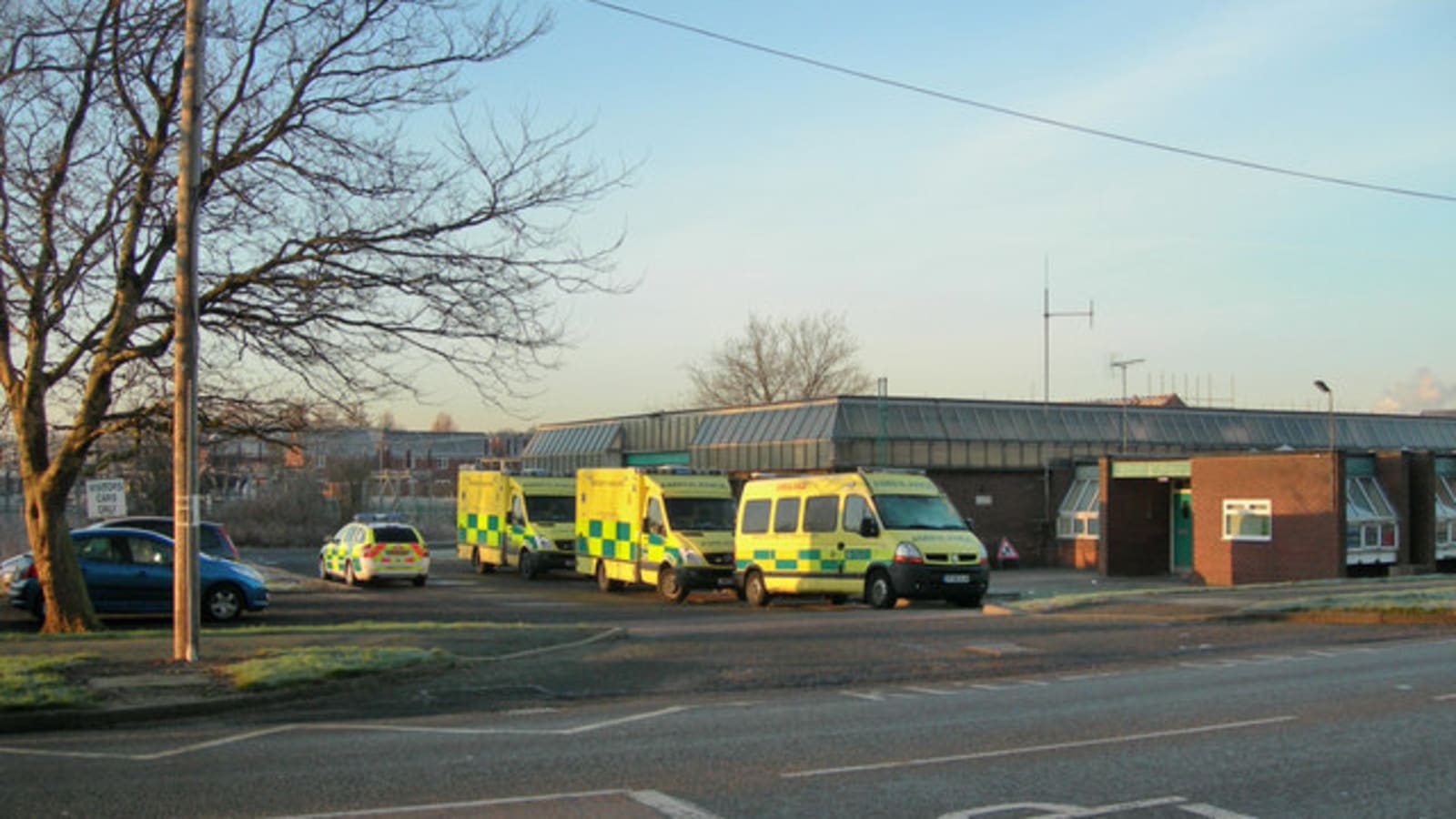 ambulances waiting on an airport tarmac at night (file image)