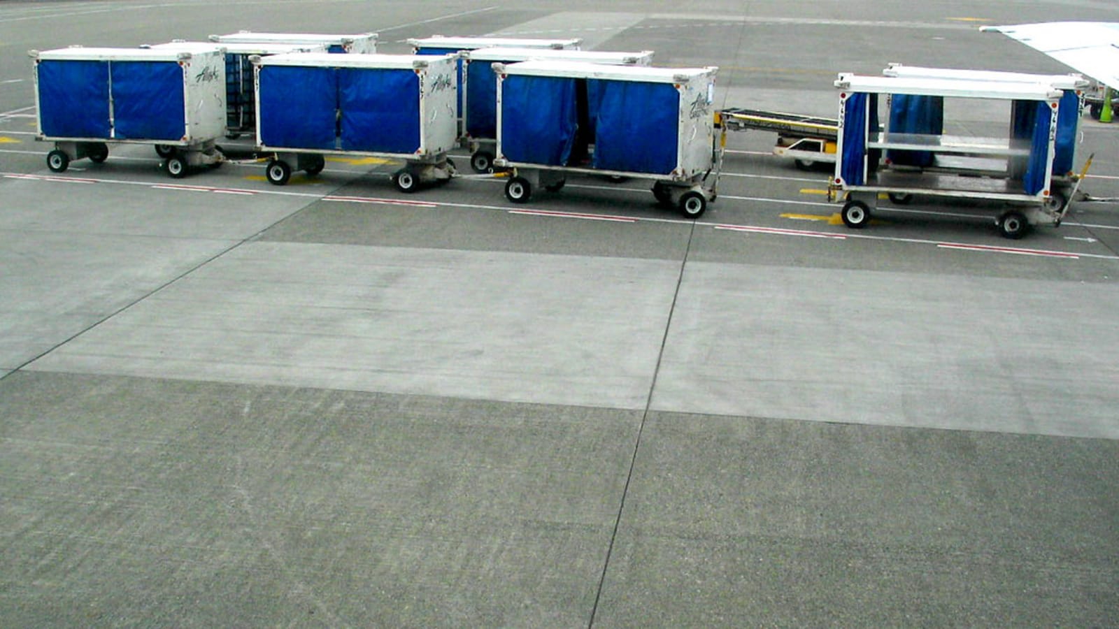 passenger airplanes parked on an airport tarmac (file image)