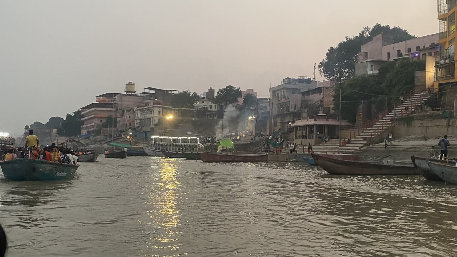 ghats along a river illuminated at dusk (file image)