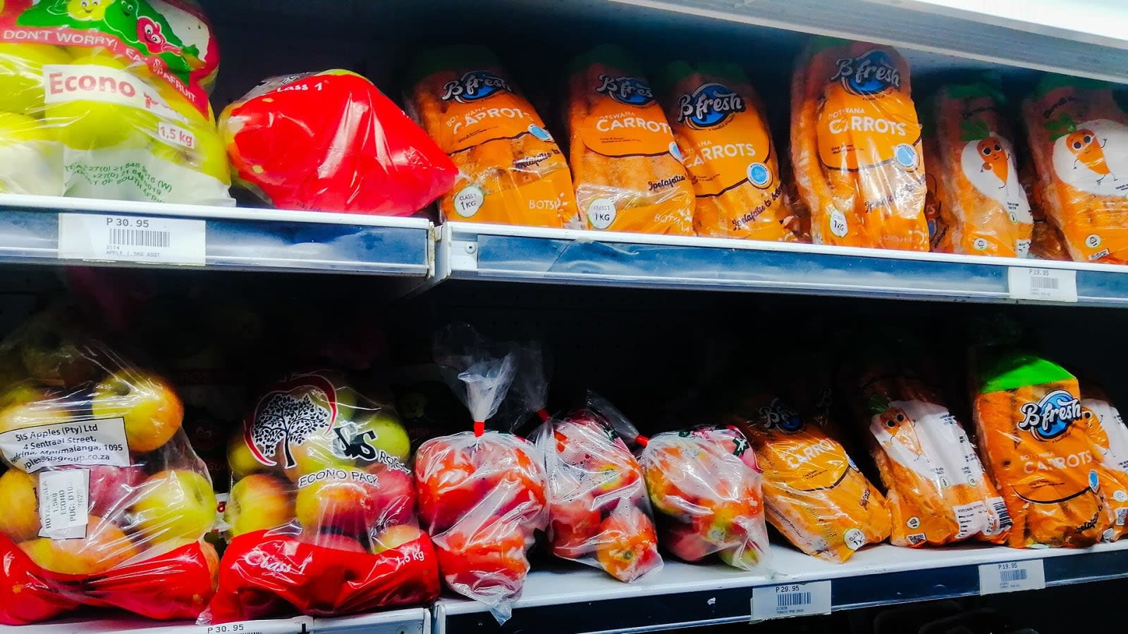 supermarket shelves stocked with packaged consumer goods (file image)