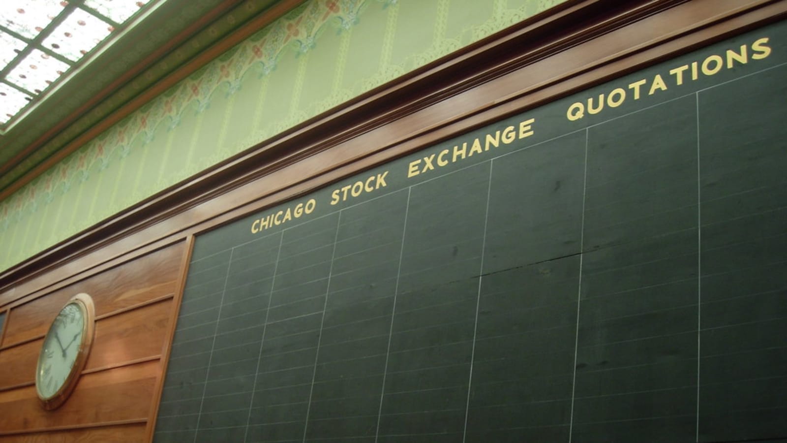 trading floor screens displaying financial market charts (file image)