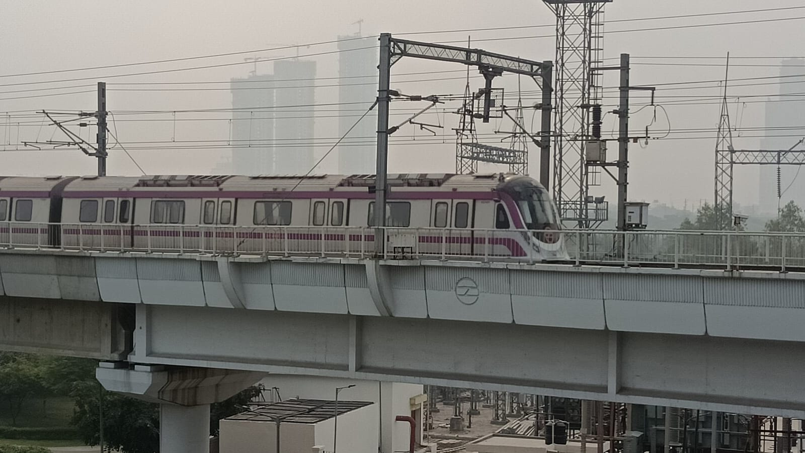 Delhi Metro train operating during protests, defying claims of cancellations.