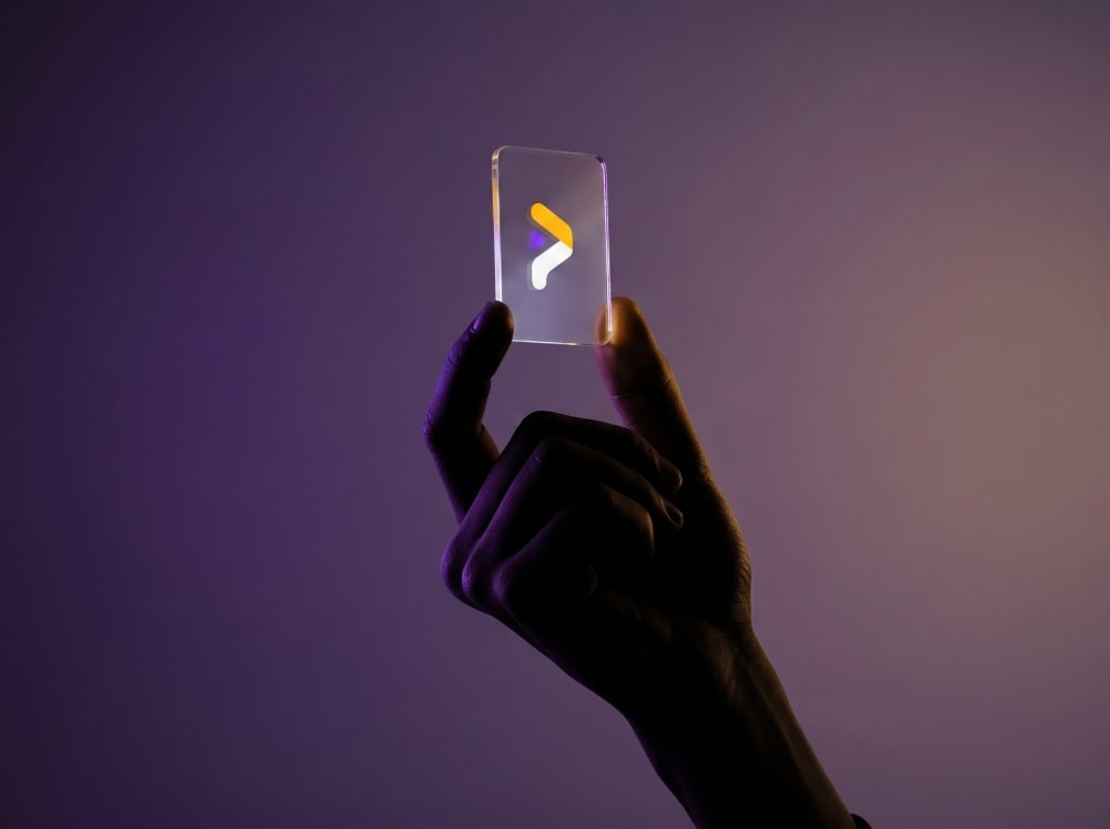 Placementstream logo held on a translucent glass card