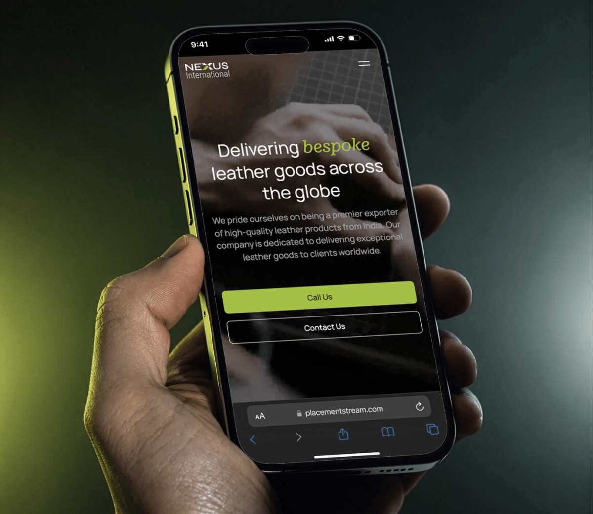 Nexus International website shown on a phone