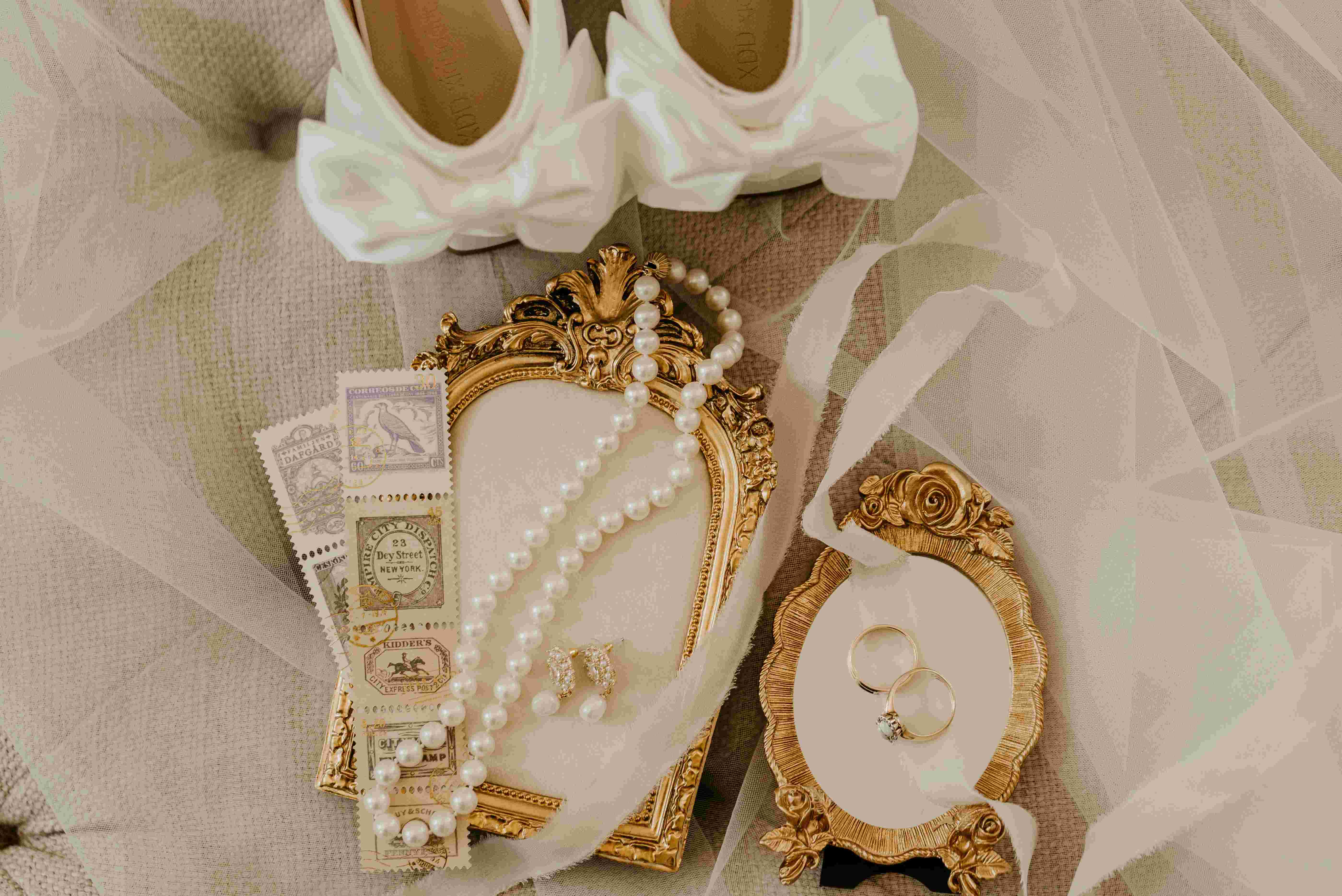 Bridal party holding pastel florals