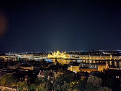 The enormous Parliament building that was built in 1896 glowing in the night view of Budapest