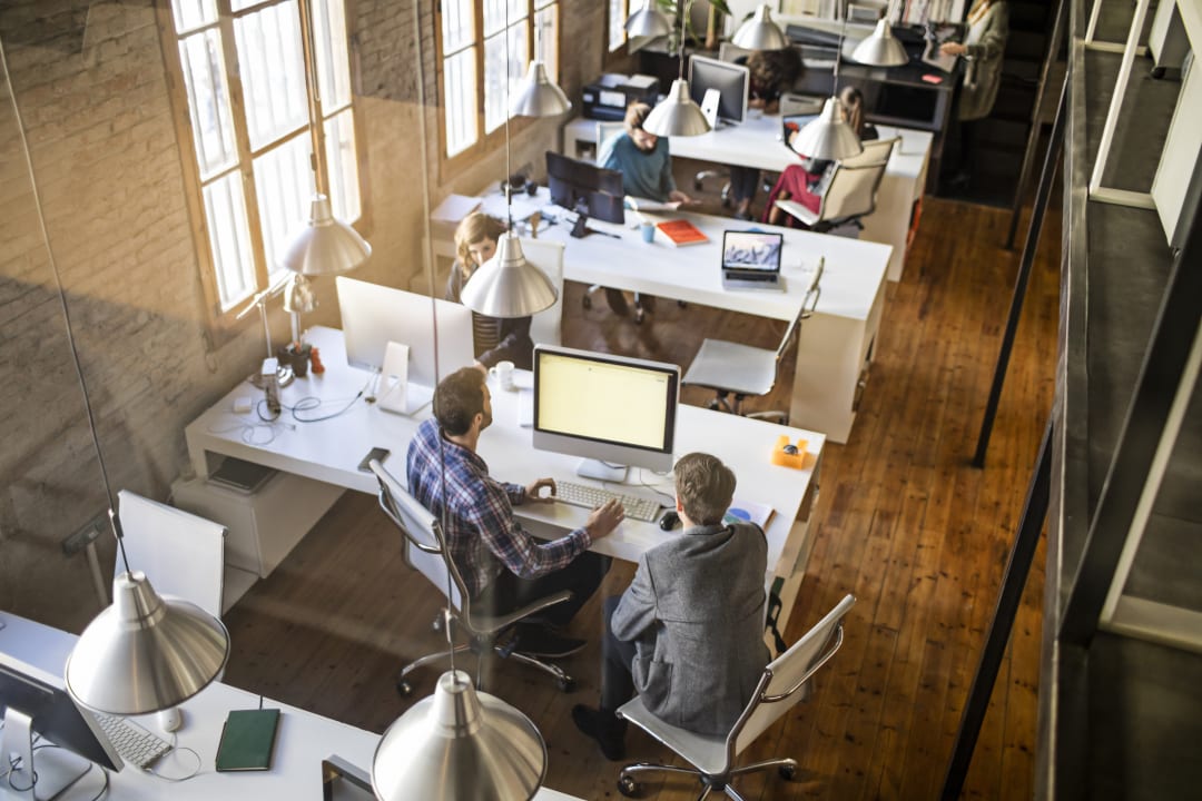 People working in a small office