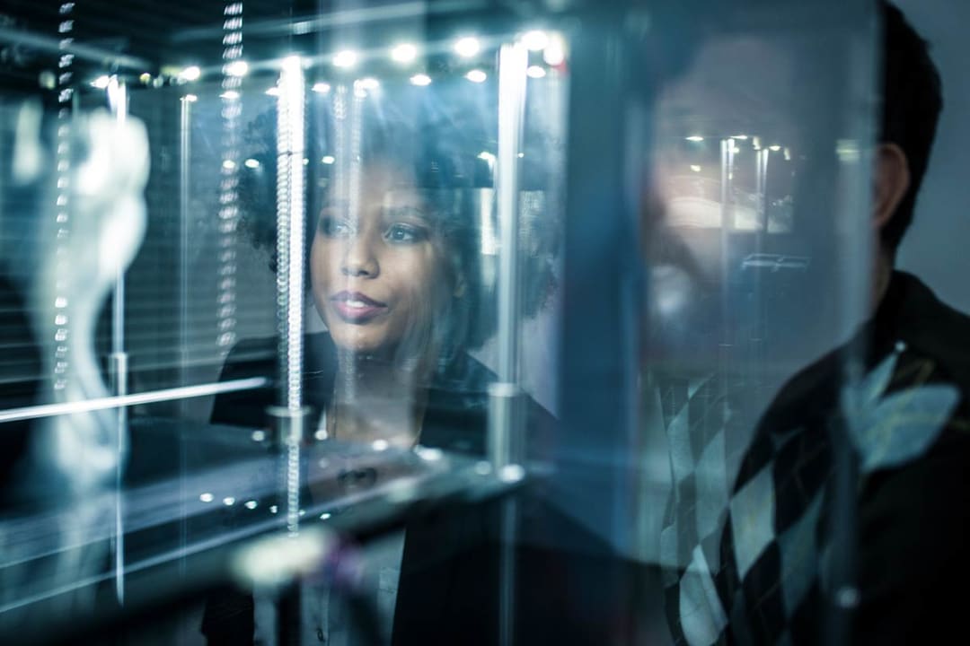 Woman observing technology