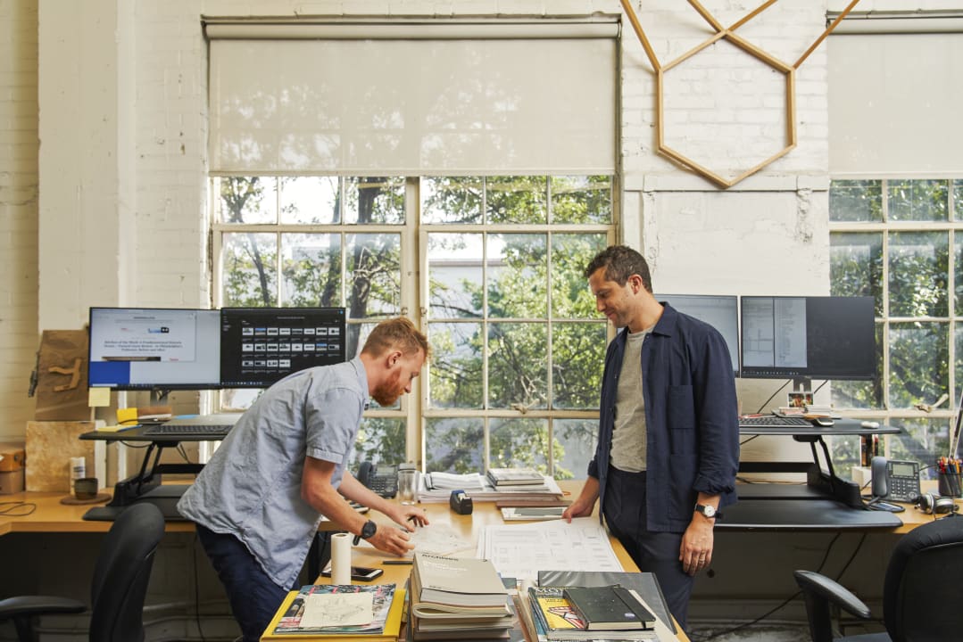 Two people collaborating on a project