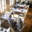 People working in a small office