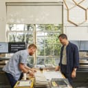 Two people collaborating on a project
