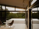 A sunlit open room in a custom home