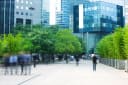 Business People Walking in Modern Financial District