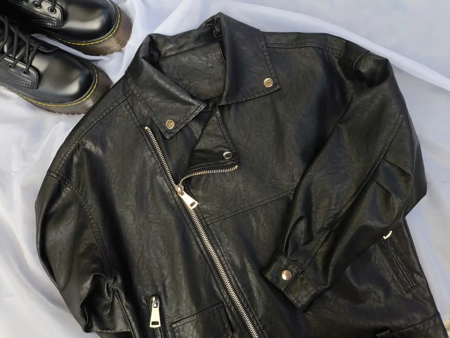 Restoring a luxury handbag and leather jacket