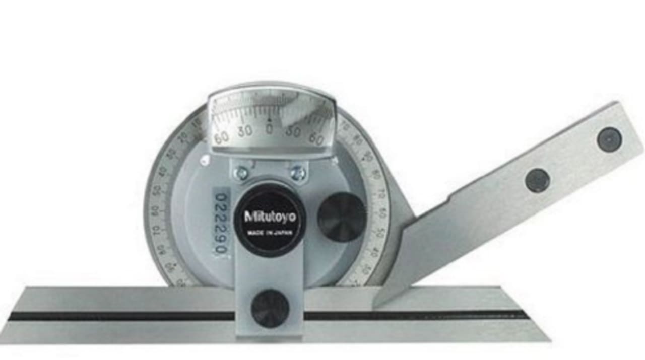 Bevel protractor measuring an angle on a machined workpiece