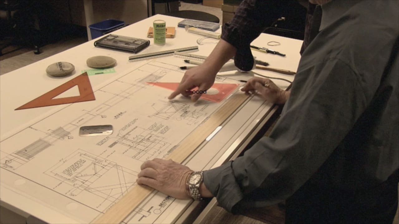 DAE Architecture students practicing manual drafting and technical drawing in Pakistan