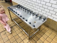 CONVEYOR FOR WASHING TRAYS