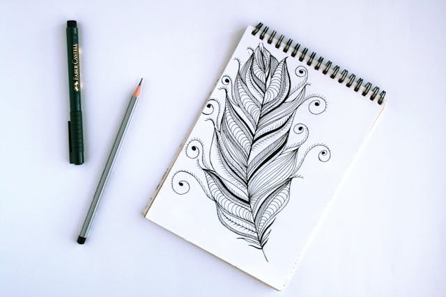 Foto oleh Alena Koval: https://www.pexels.com/id-id/foto/buku-musim-semi-dengan-sketsa-bulu-826114/