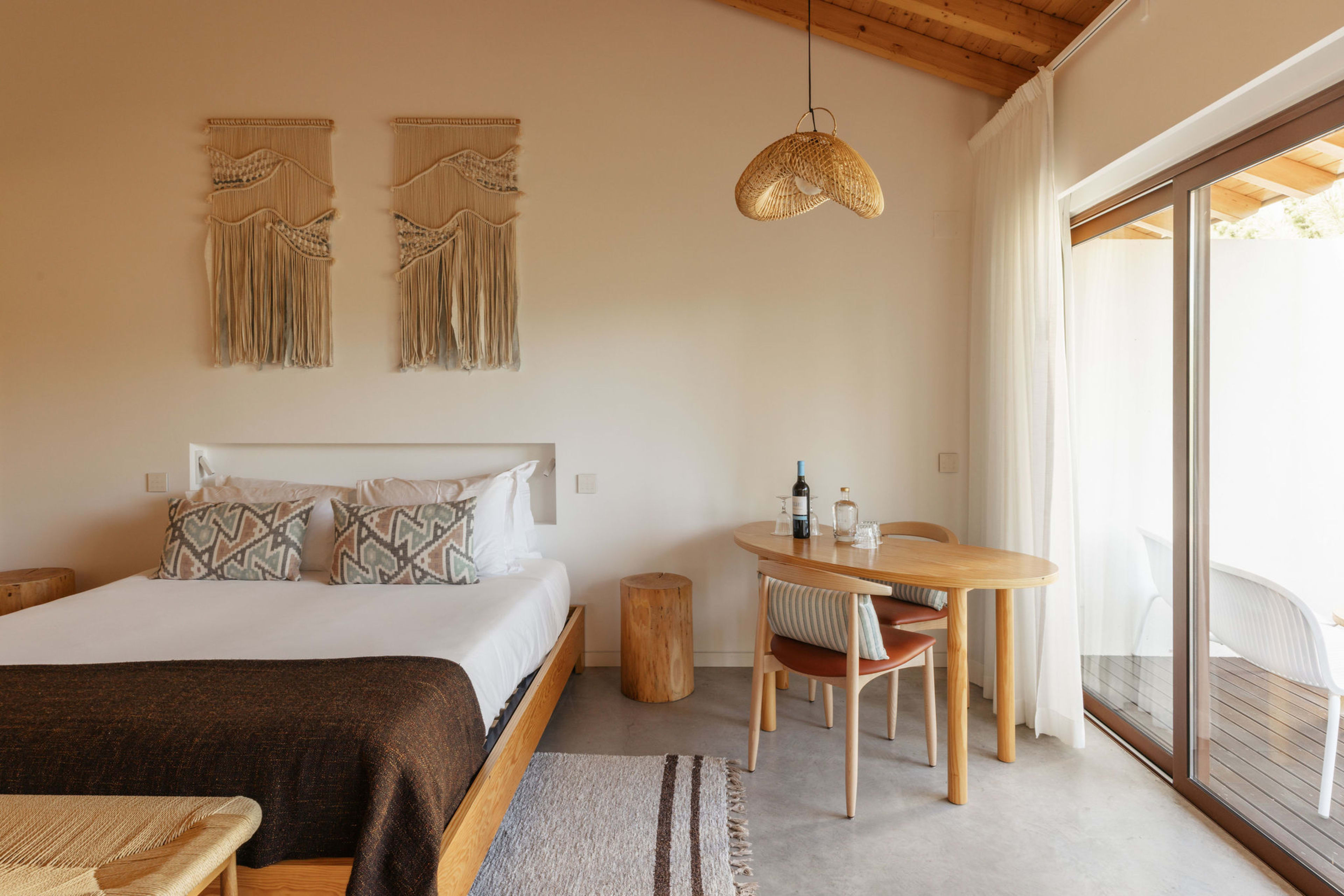Bedroom opening to the pines