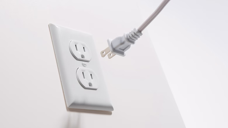 Plugging Two-Prong Devices into Three-Prong Outlets: Safety Implications Explained