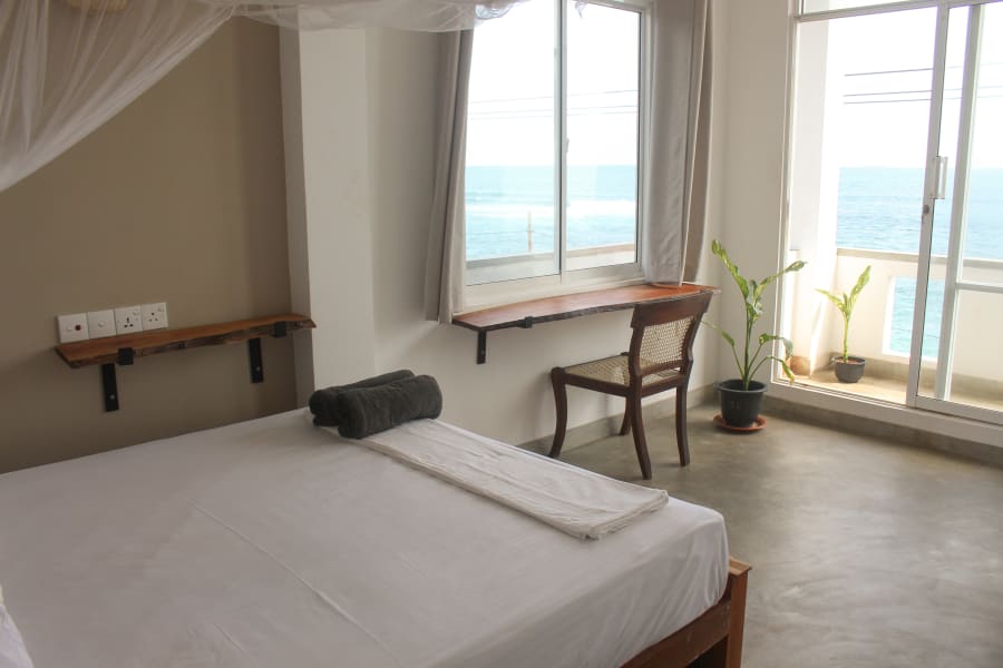 Room 06 Sunrise Suite bed