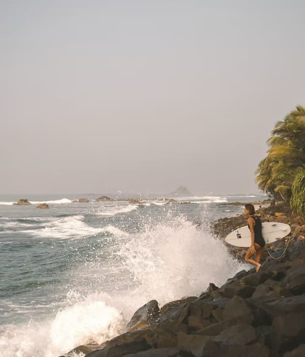 Surfer at Midigama