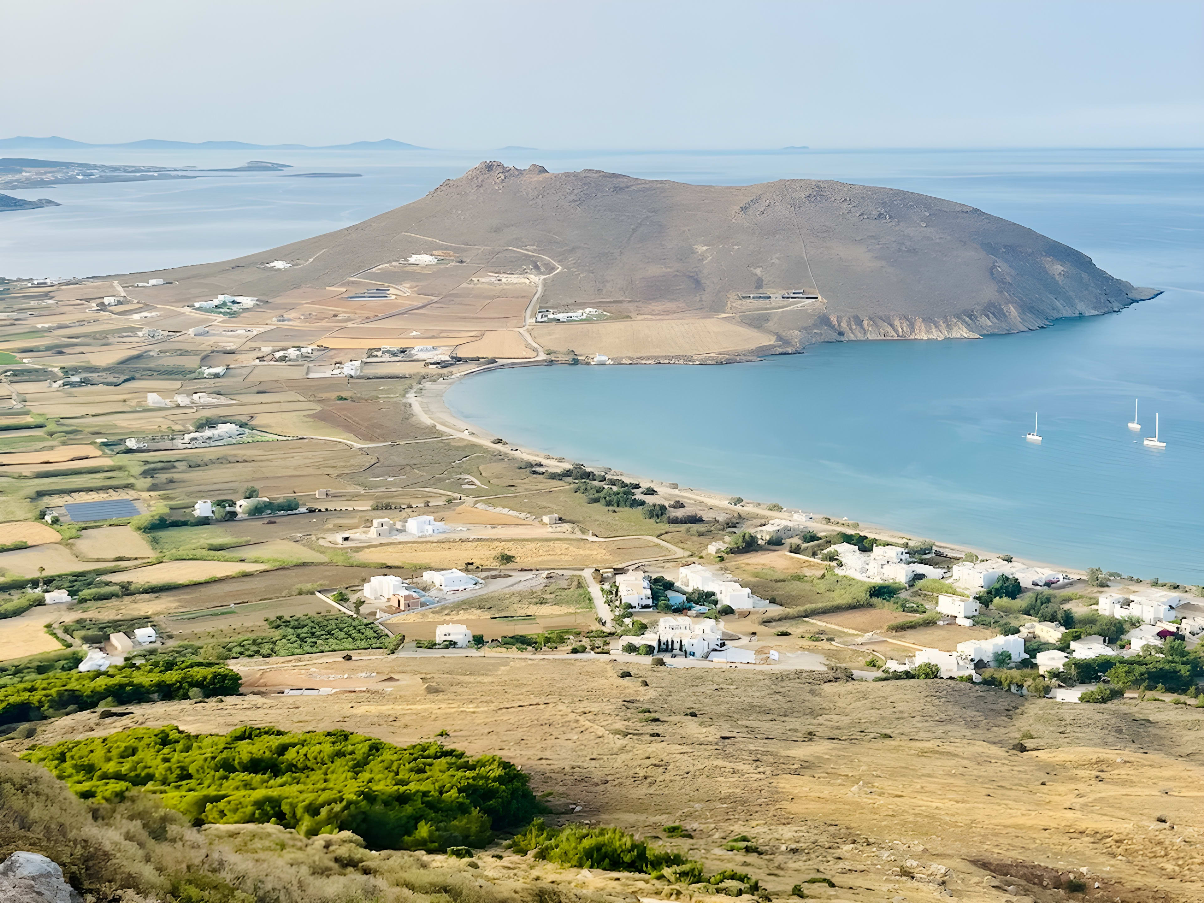 A breathtaking view from St. Antonios Monastery over the landscape and sea in Paros. Exploring such scenic viewpoints is essential when planning what to do in Paros.