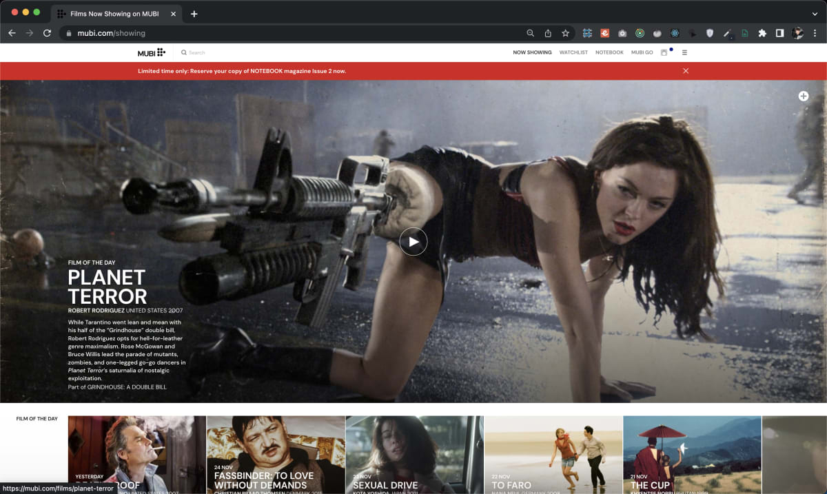 Homepage of MUBI streaming service displaying the 'Film of the Day', 'Planet Terror' by Robert Rodriguez. A central image features Rose McGowan as Cherry Darling with a machine gun prosthetic leg in an action pose. Below, additional films like 'Yesterday', 'Fassbinder: To Love Without Demands', and 'Sexual Drive' are showcased with small posters.