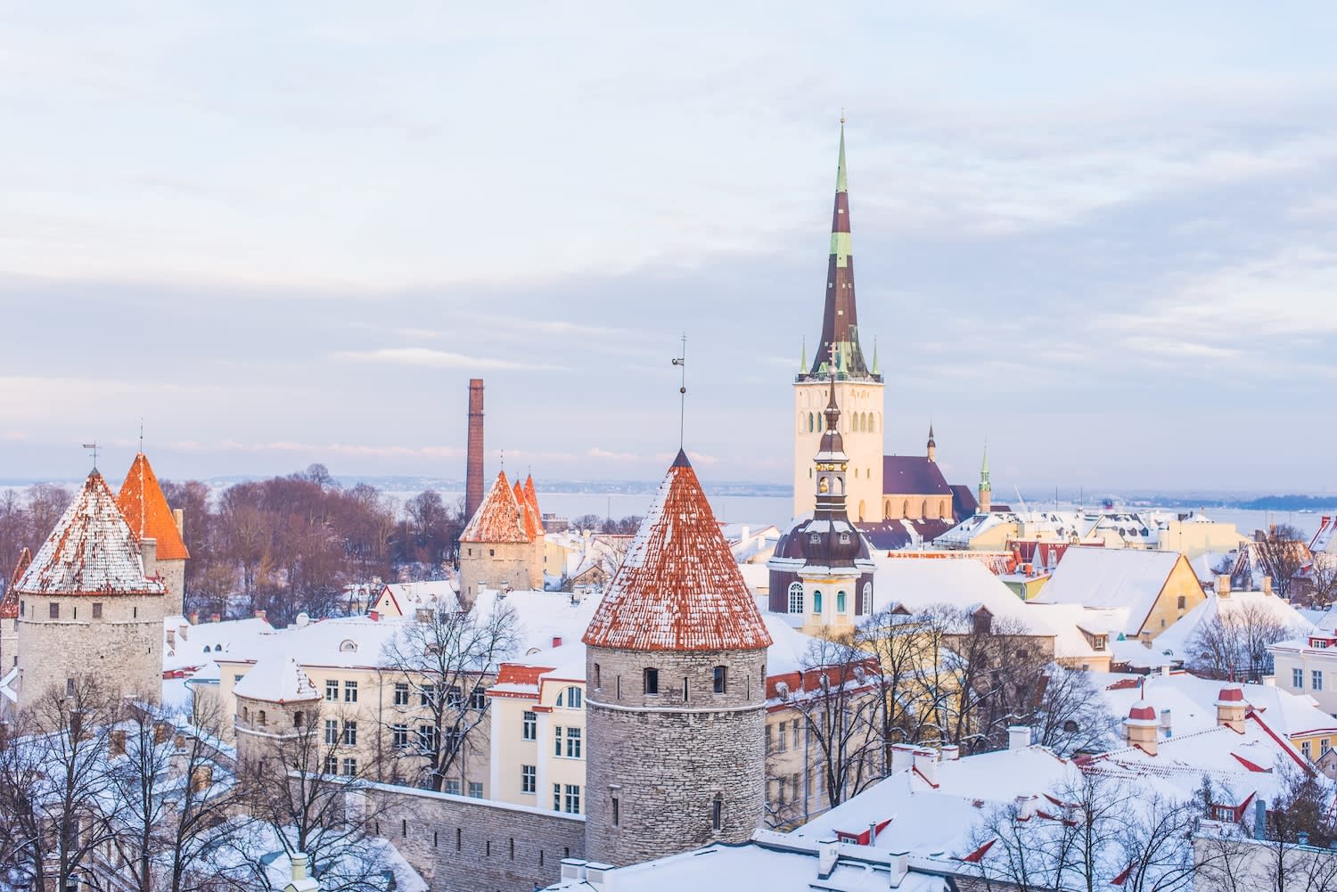 A winter scene in Tallinn with medieval architecture under a blanket of snow, one of the best cities for digital nomads, celebrated for its digital infrastructure and historical charm.