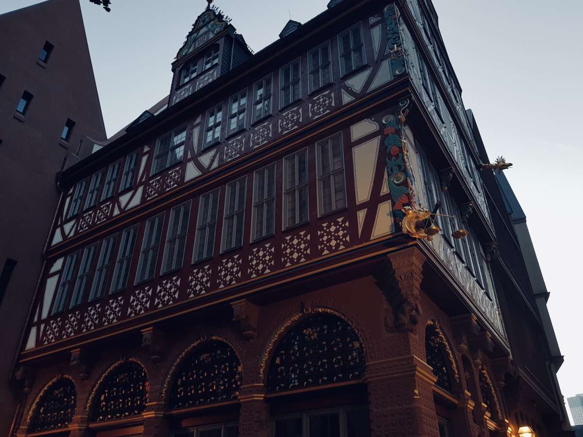 Half-timbered historical building in gay Frankfurt, showcasing traditional German architecture at dusk.