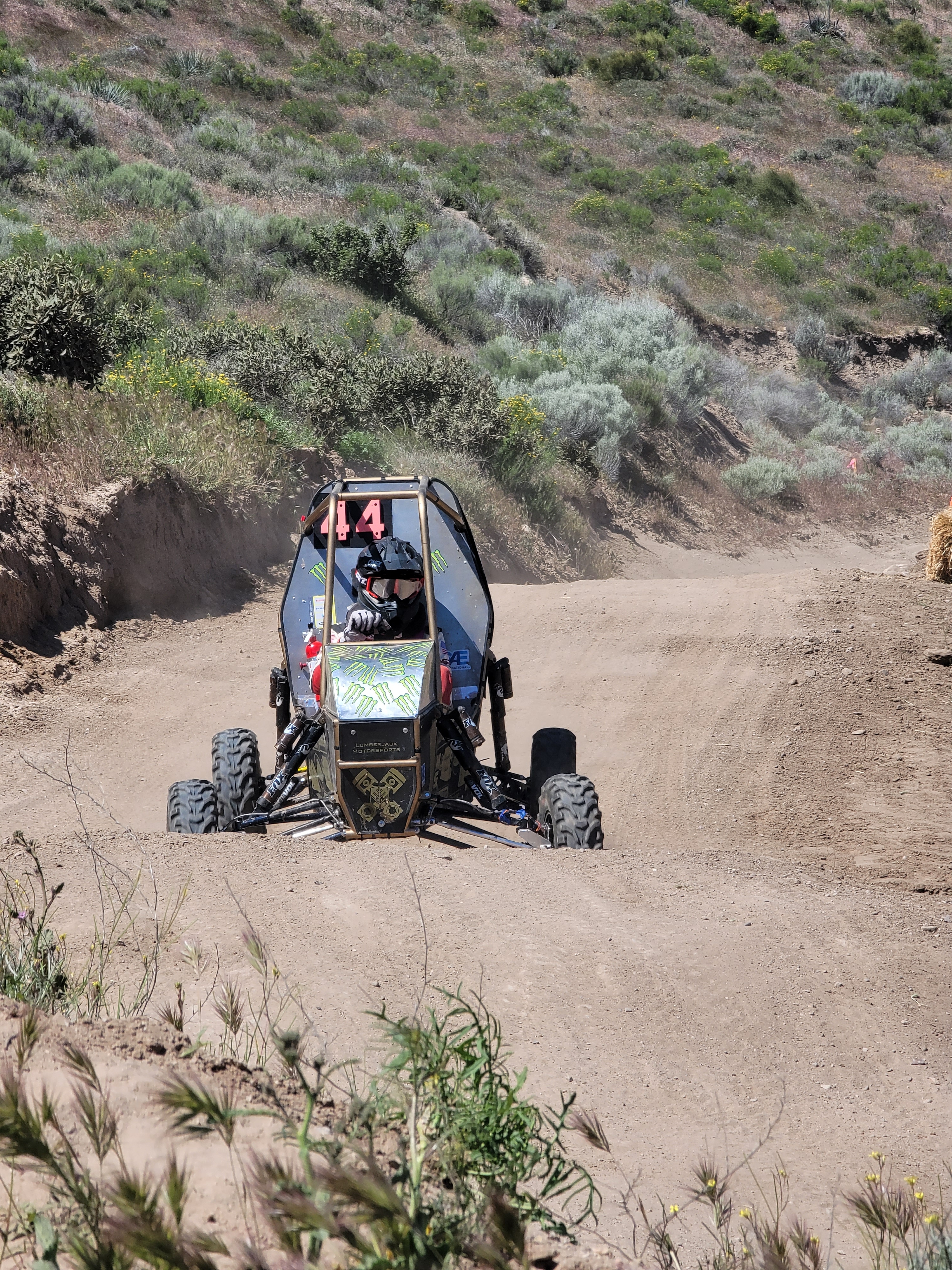 Baja Car driving down track