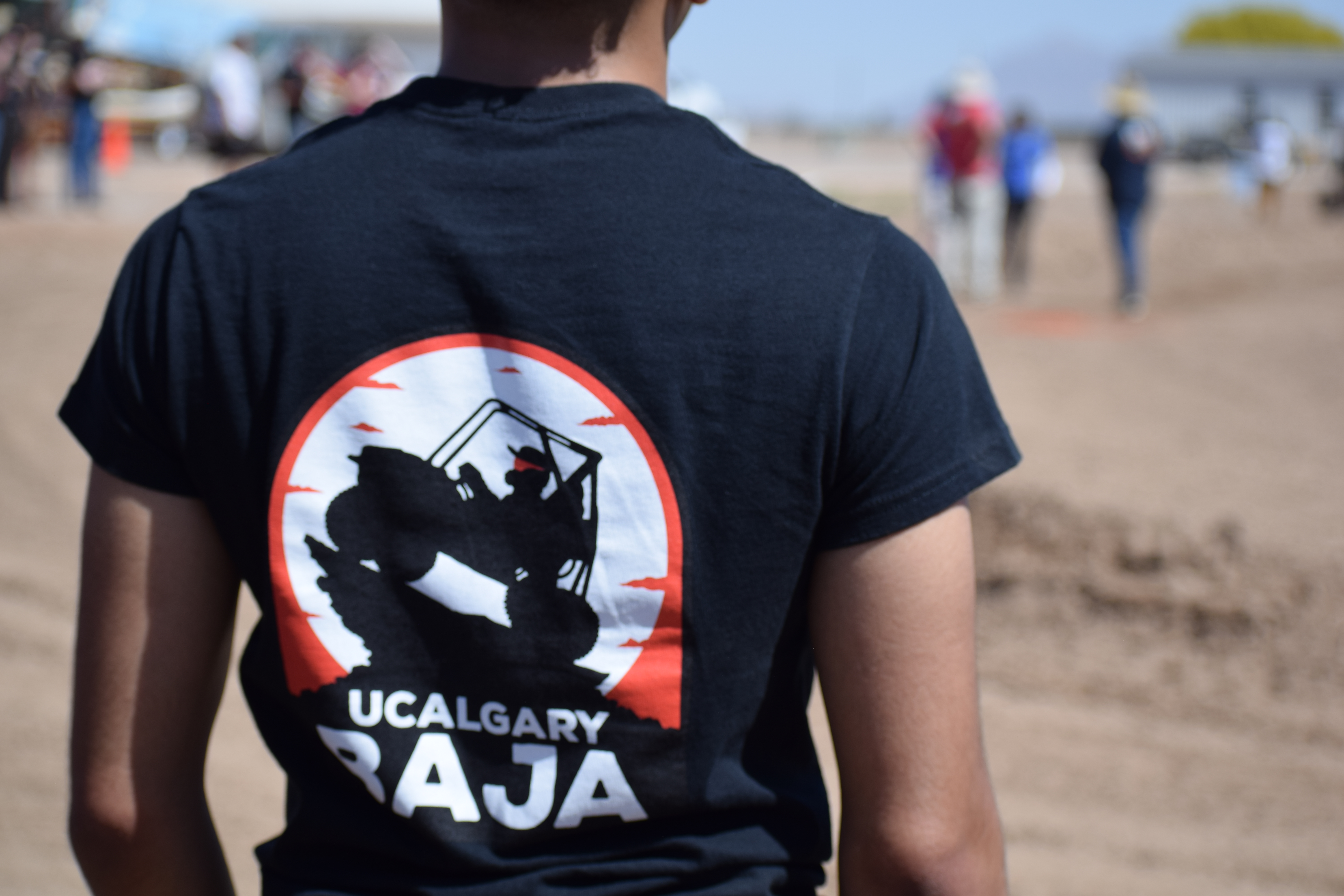 member wearing ucalgary baja t-shirt
