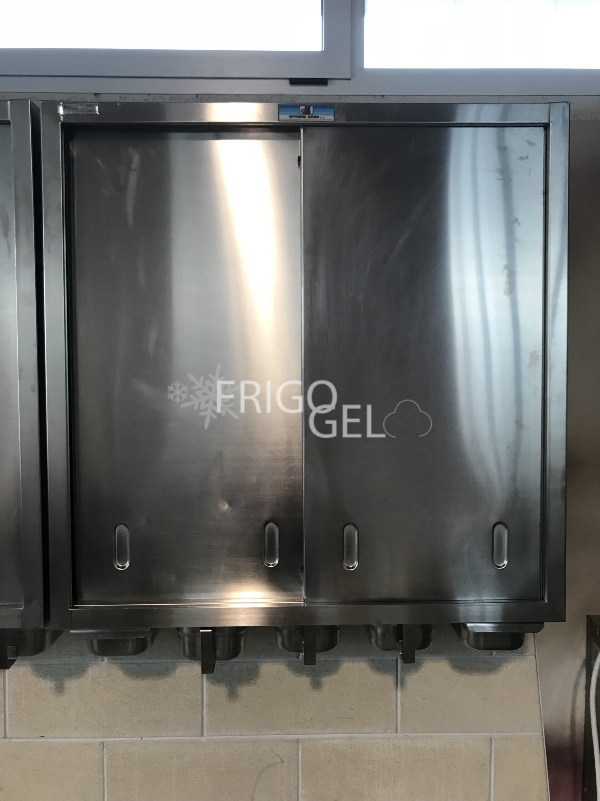 Bano stainless steel wall cabinet with tray-holder door