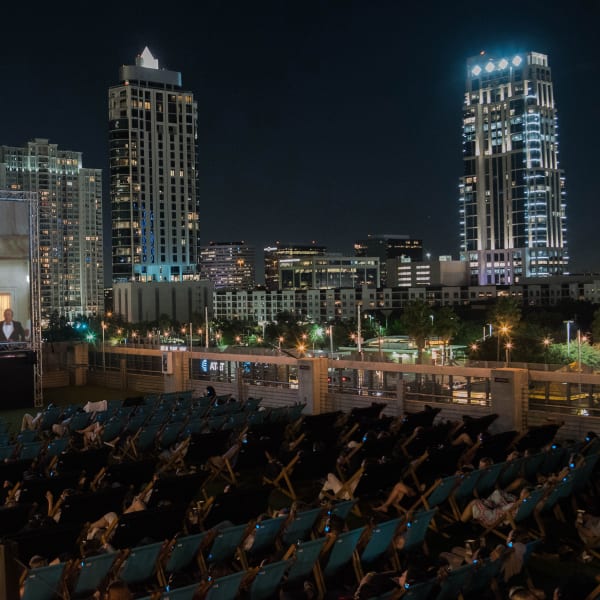 rooftop-cinema-club-uptown-houston-movies-date-night-under-the-stars-guests-screening.jpg