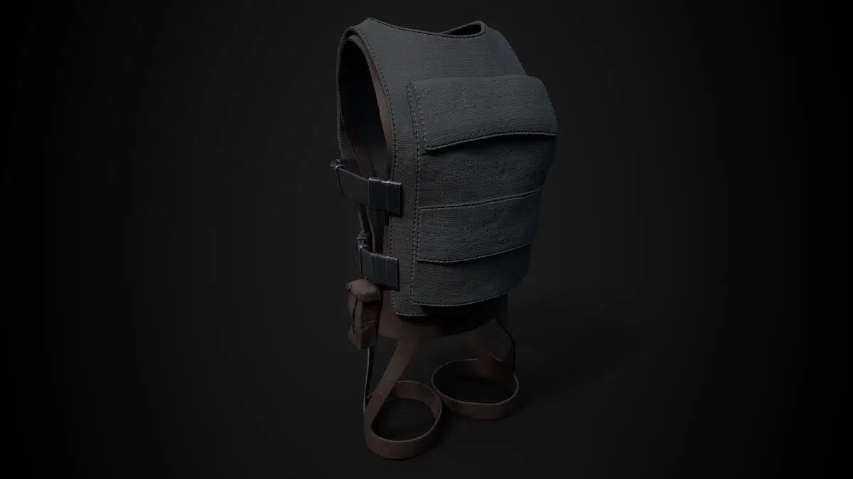 Modelado 3D de un chaleco táctico negro con hebillas y correas sobre fondo oscuro, de Miguel Rodríguez García, alumno de Videojuegos en TRAZOS