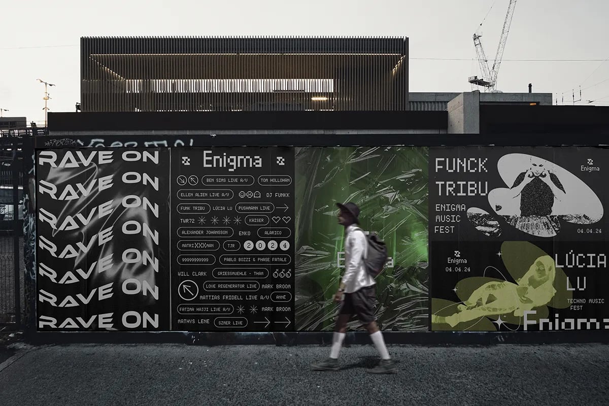 Mockup de la valla de calle del festival Enigma con un viandante, de Iman Drissi, alumna de Diseño Gráfico y Motion Graphics en TRAZOS