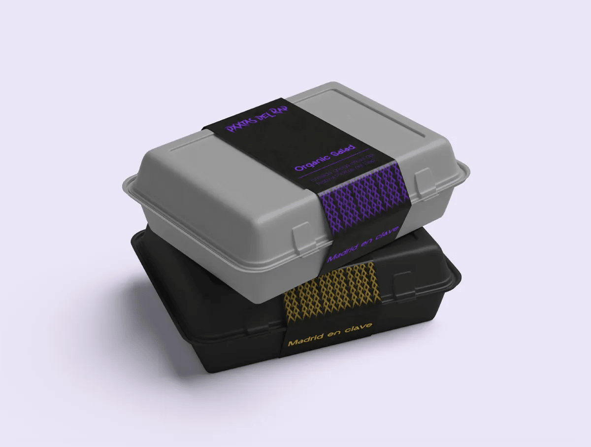 Cajas de comida con faja de Pxxtas del Rap, de Gonzalo Martínez Gómez, alumno de Diseño Gráfico y Motion Graphics en TRAZOS