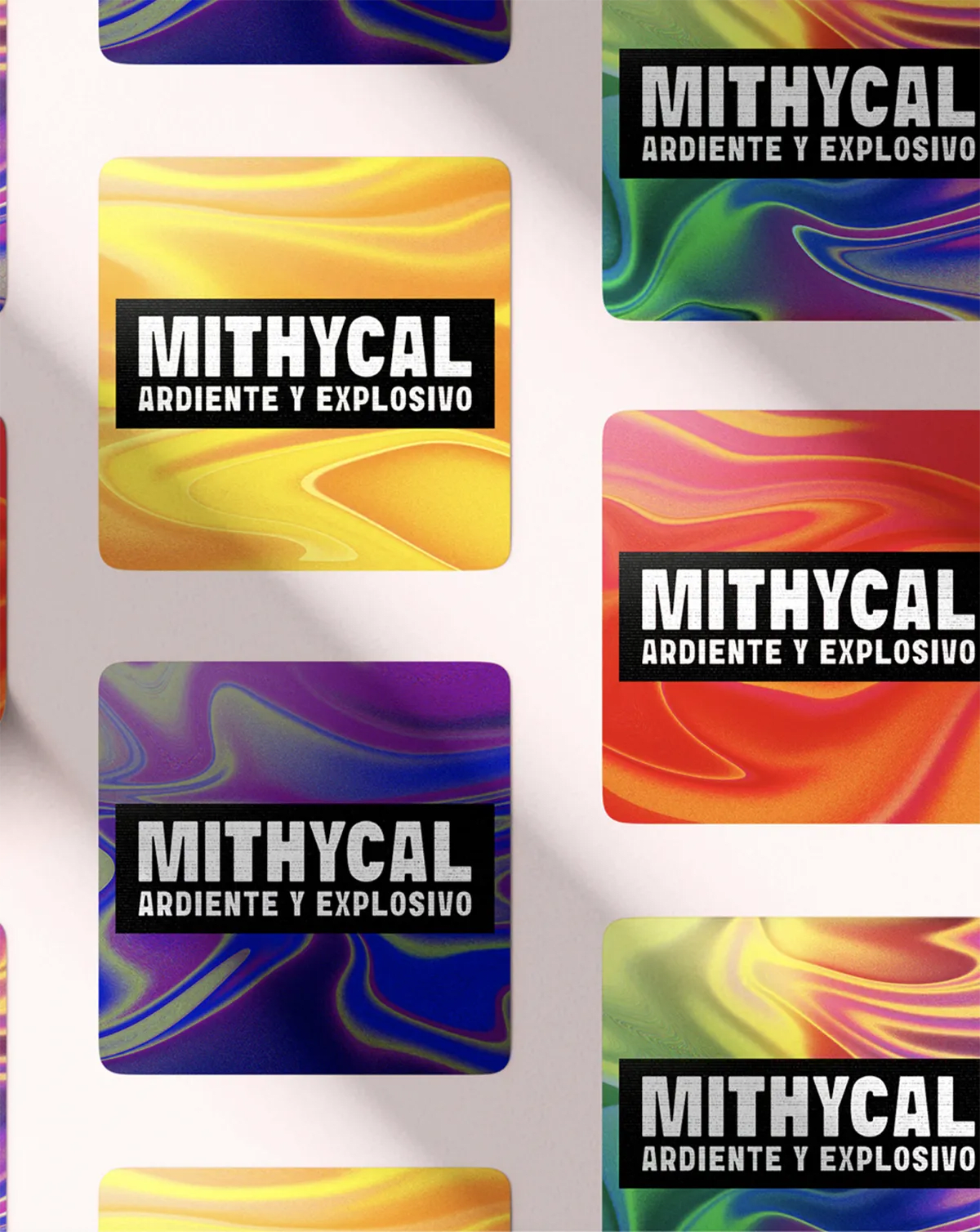 Plana de stickers cuadrados con gradientes holográficos para el festival Mithycal 'Ardiente y Explosivo', de José Paredes, alumno de Diseño Gráfico y Motion Graphics en TRAZOS