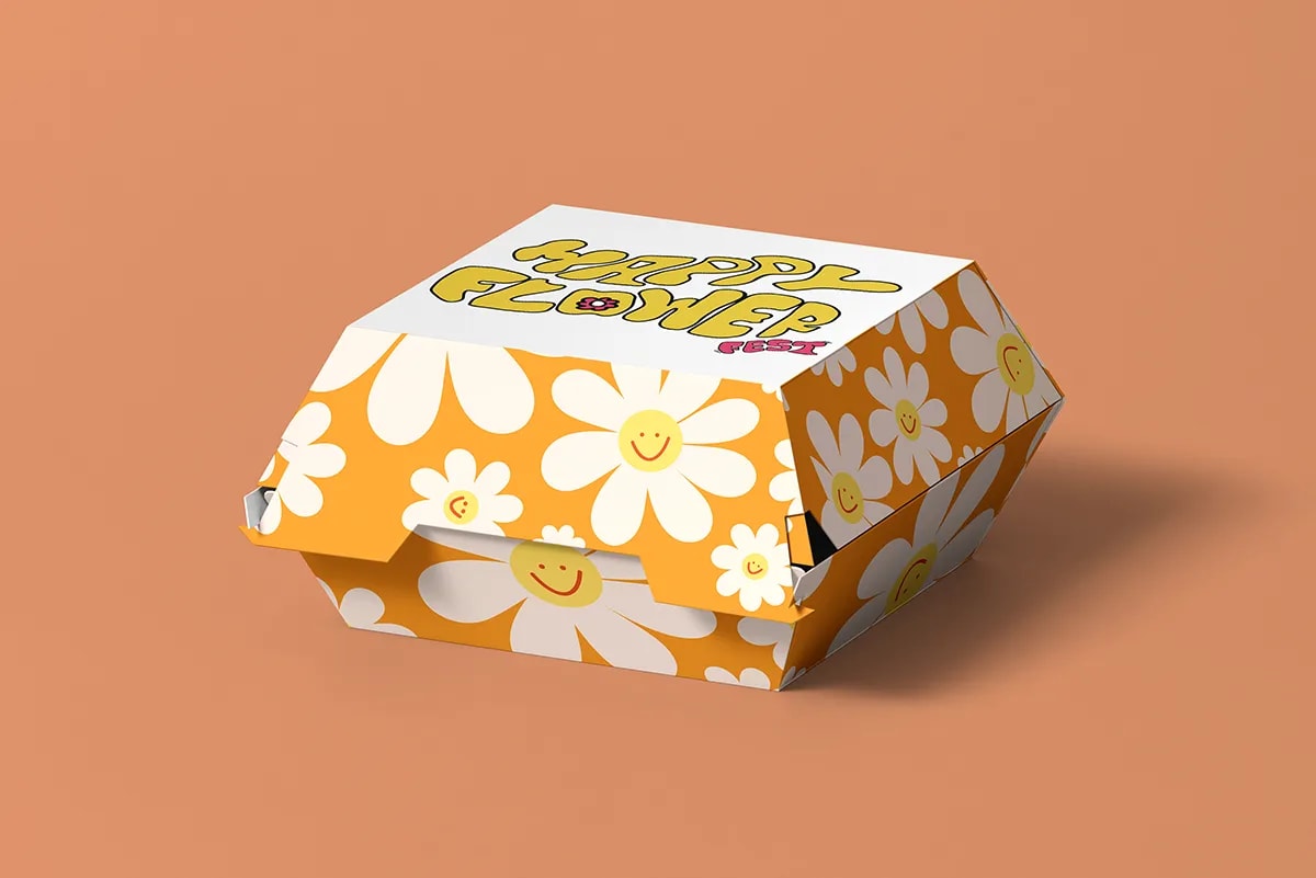 Caja de hamburguesa Happy Flower Fest con estampado de margaritas, de Sofía Villalta, alumna de Diseño Gráfico y Motion Graphics en TRAZOS