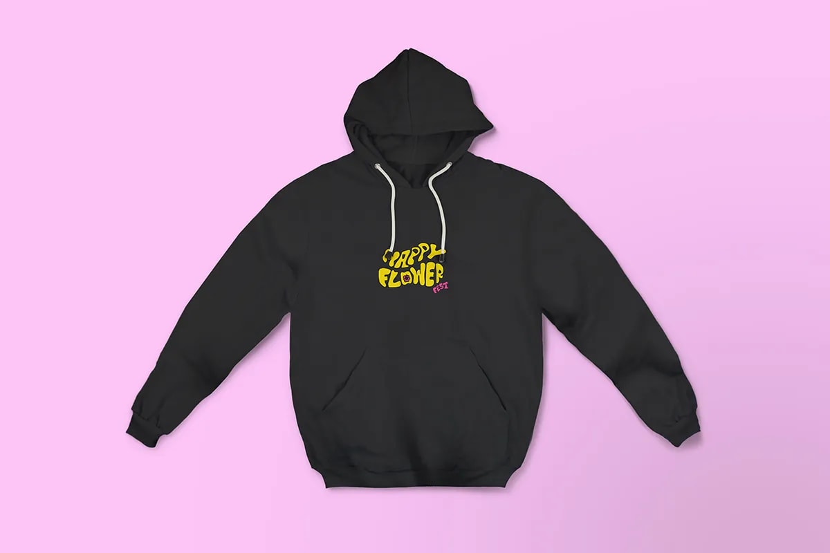 Sudadera negra de Happy Flower Fest con el logotipo amarillo en el pecho, de Sofía Villalta, alumna de Diseño Gráfico y Motion Graphics en TRAZOS