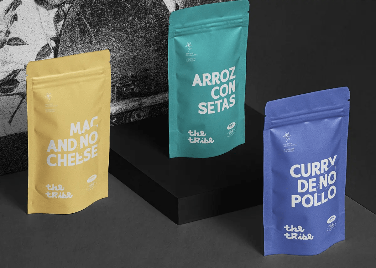 Gama de bolsas de The Tribe con tres sabores en amarillo, verde y azul, de Ene Irimia, alumna de Diseño Gráfico y Motion Graphics en TRAZOS