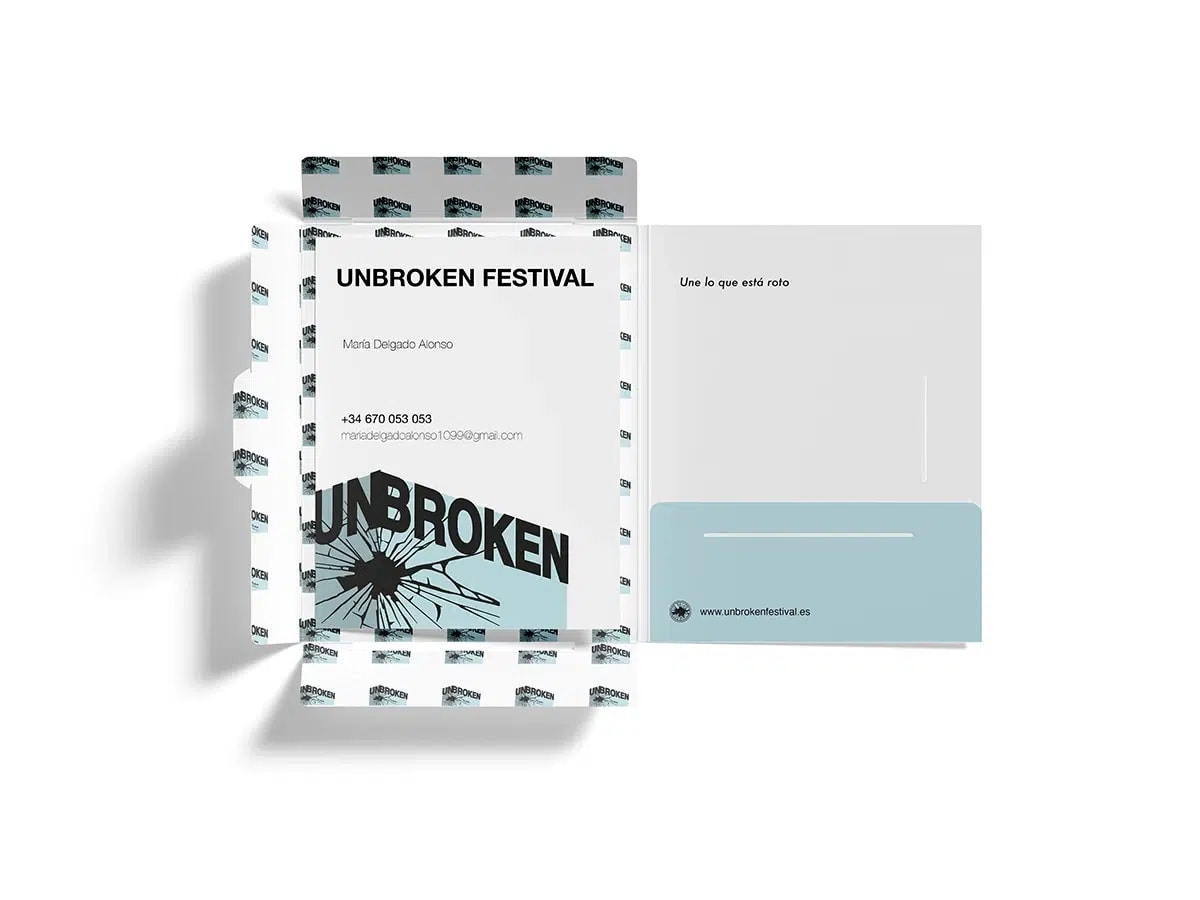 Carpeta de papelería del Unbroken Festival con datos de contacto y logotipo de cristal roto, de María Delgado, alumna de Diseño Gráfico y Motion Graphics en TRAZOS